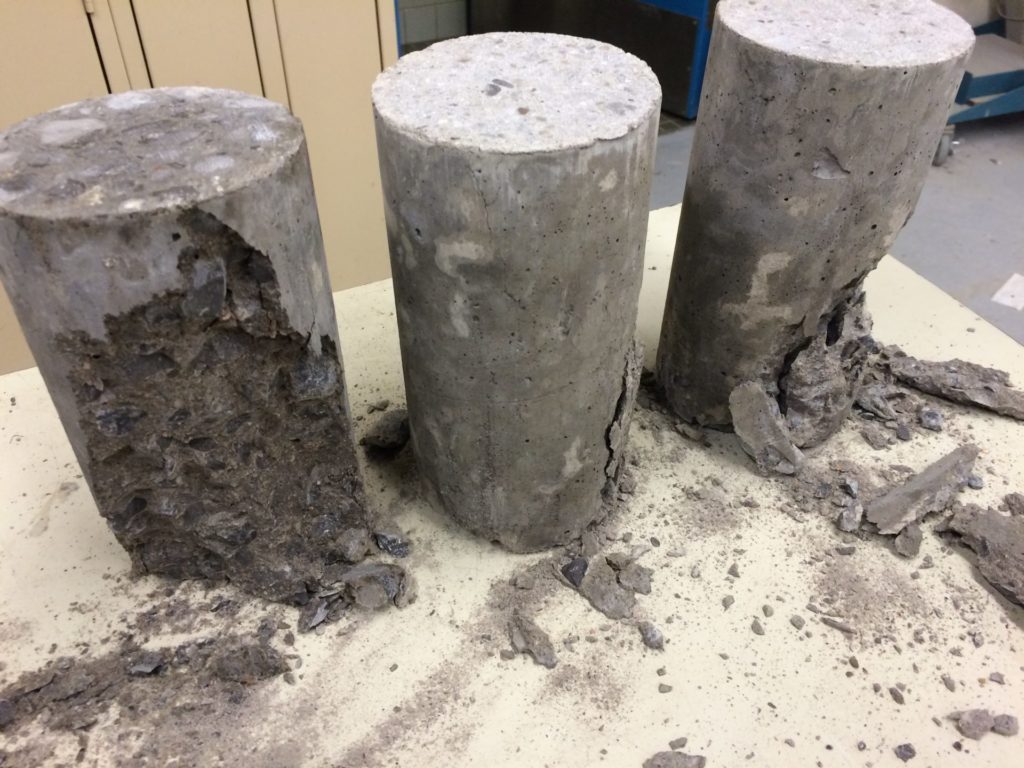 Concrete cylinder break test.