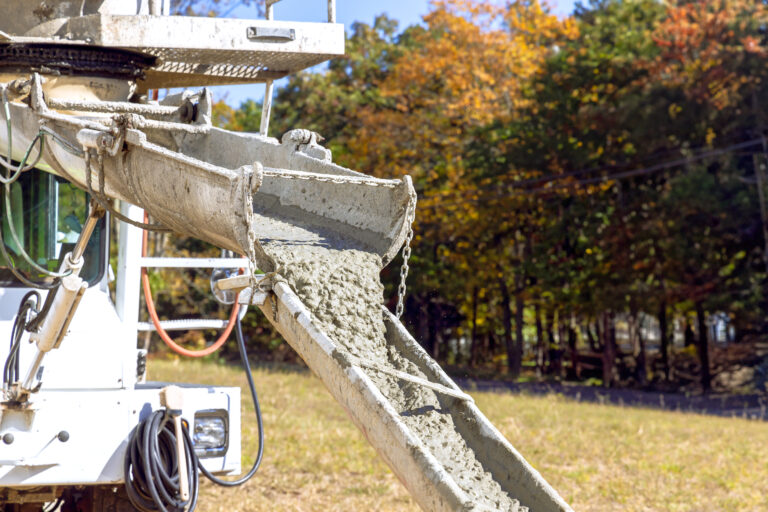 Construction site liquid cement concrete was poured from a concrete mixer truck